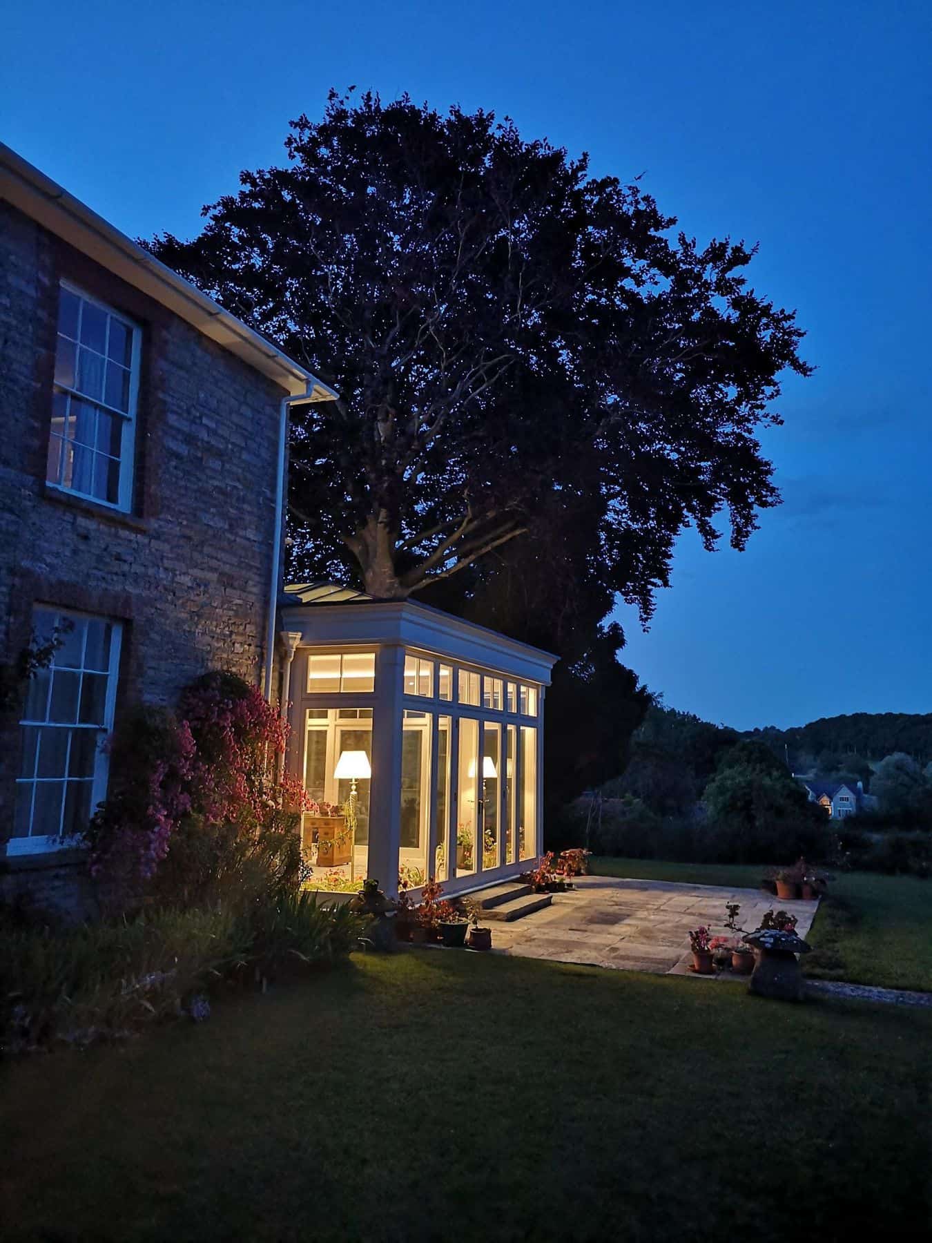 wooden garden room evening view