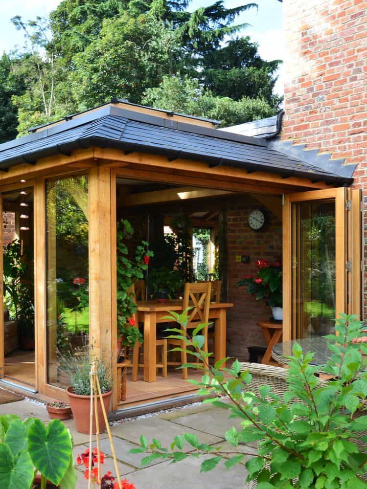 oak orangery with indoor plants