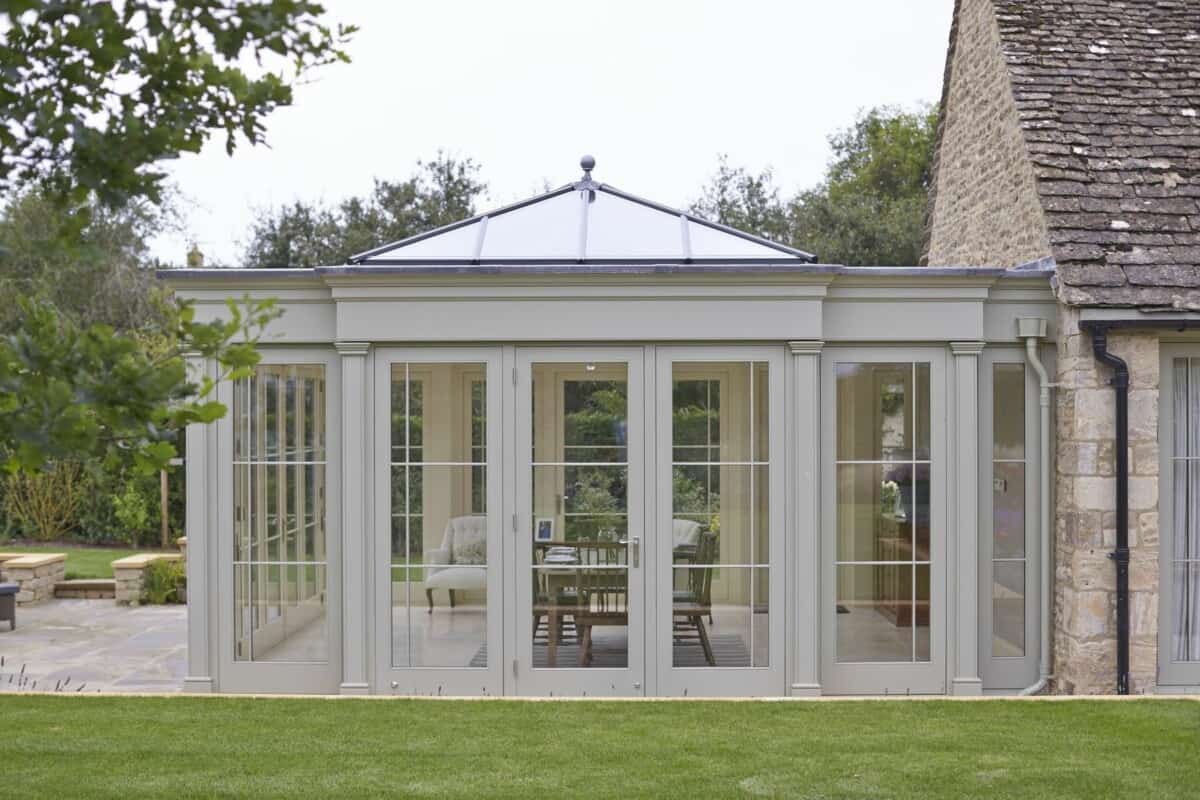 wooden orangery with bi-fold doors