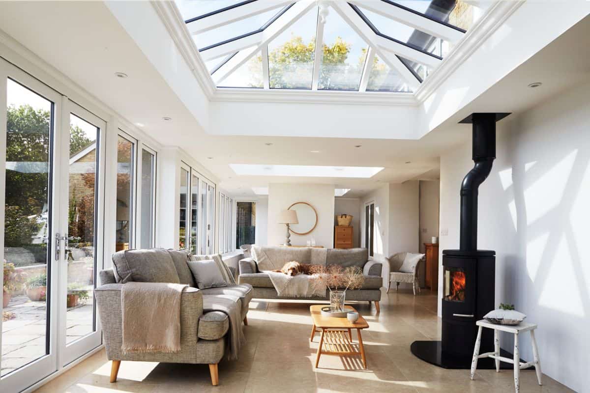 orangery living room with log burner