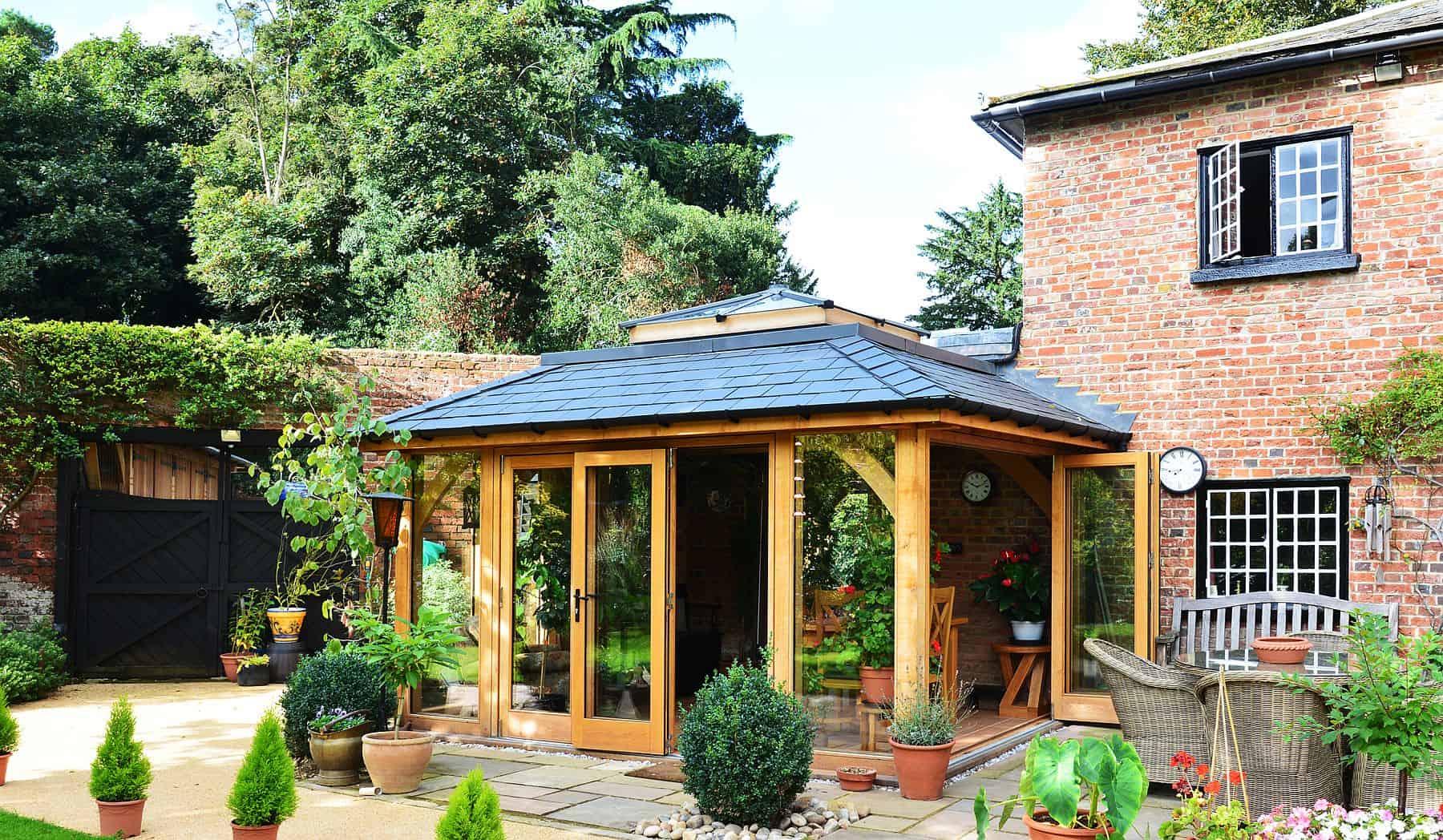 oak mansard orangery with bi-folds